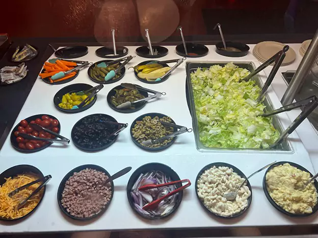 Salad bar with fresh vegetables | customized Pizza toppings at Partons Pizza